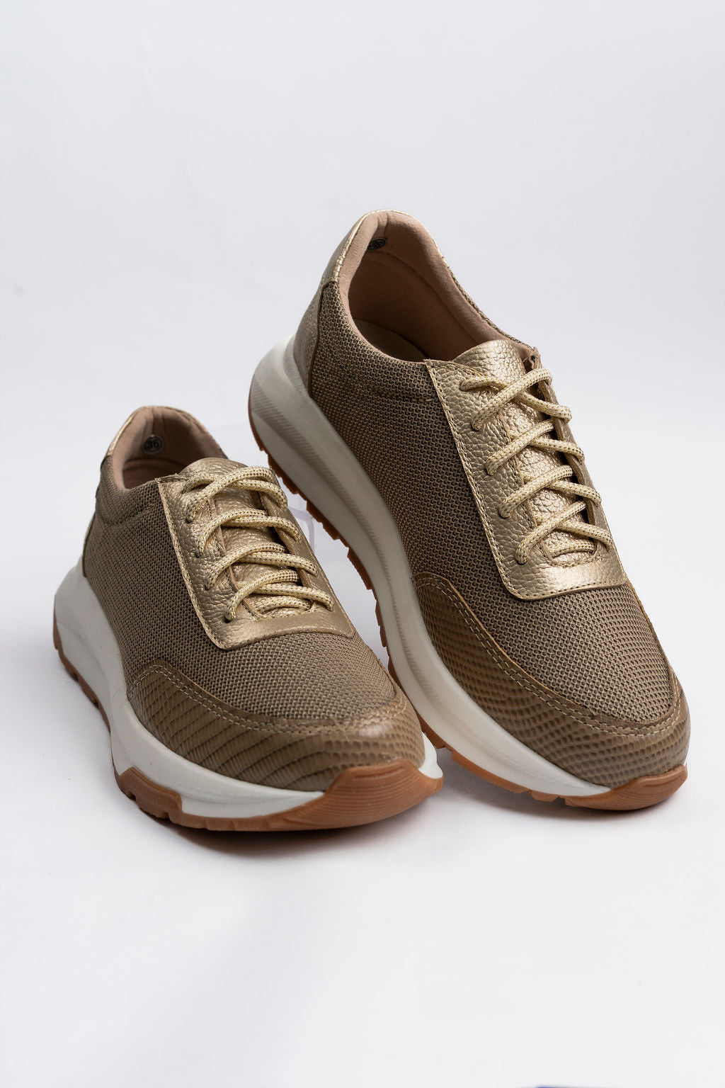 Destello dorado Tenis